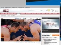 Bild zum Artikel: 'Sie töten den Olympischen Geist': Ringer laufen weltweit Sturm