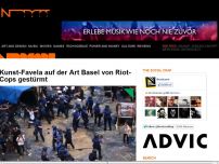 Bild zum Artikel: Kunst-Favela auf der Art Basel von Riot-Cops gestürmt