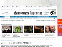 Bild zum Artikel: „T-I-T-T-E-N“ auf der Straße