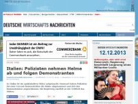 Bild zum Artikel: Italien: Polizisten nehmen Helme ab und folgen Demonstranten