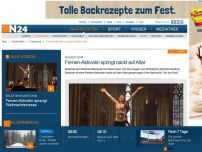 Bild zum Artikel: Kölner Dom - 
Femen-Aktivistin springt nackt auf Altar