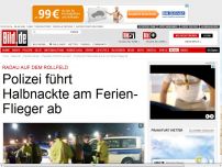 Bild zum Artikel: Radau auf dem Rollfeld - Polizei führt Halbnackte am Ferien-Flieger ab
