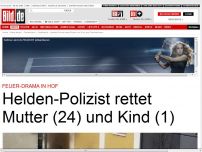 Bild zum Artikel: Feuer Drama - Helden-Polizist rettet Mutter (24) und Kind (1)