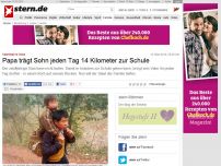 Bild zum Artikel: Vaterliebe in China: Papa trägt Sohn jeden Tag 14 Kilometer zur Schule