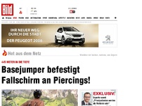 Bild zum Artikel: 445 Meter in die Tiefe - Basejumper befestigt Fallschirm an Piercings!