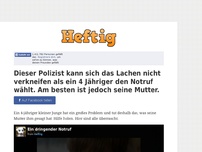 Bild zum Artikel: Dieser Polizist kann sich das Lachen nicht verkneifen als ein 4 Jähriger den Notruf wählt. Am...