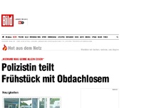 Bild zum Artikel: Als Heldin gefeiert - Polizistin teilt Frühstück mit Obdachlosem