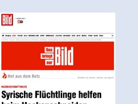 Bild zum Artikel: Nachbarschaftshilfe - Flüchtlinge helfen beim Heckenschneiden