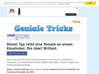 Bild zum Artikel: Dieser Typ reibt eine Tomate an einem Käsehobel. Die Idee? Brillant.