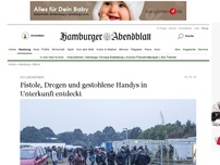 Bild zum Artikel: Asylbewerber : Pistole, Drogen und gestohlene Handys in Unterkunft entdeckt