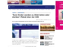 Bild zum Artikel: 'Eure Kinder werden zu Allah beten oder sterben'-Plakat über der A46