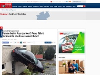 Bild zum Artikel: Mauer als Sprungschanze - Panne beim Ausparken! Frau fährt rückwärts die Hauswand hoch