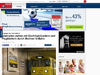 Bild zum Artikel: Anhänger der Terrormiliz IS - Islamisten ziehen mit Dschihad-Liedern und Flugblättern durch Berliner U-Bahn