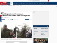 Bild zum Artikel: Idomeni - Flüchtlinge stürmen Grenzzaun - Mazedonische Polizei setzt Tränengas ein