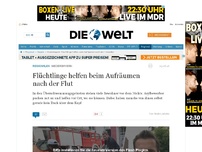 Bild zum Artikel: Niederbayern: Flüchtlinge helfen beim Aufräumen nach der Flut