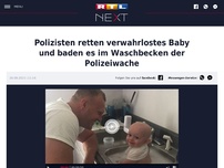 Bild zum Artikel: Polizisten retten verwahrlostes Baby und baden es im Waschbecken der Polizeiwache