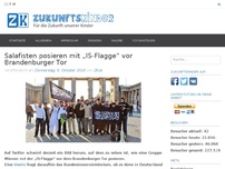 Bild zum Artikel: Männer posieren mit „IS-Flagge“ vor Brandenburger Tor