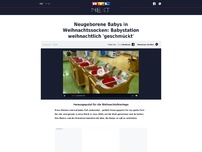 Bild zum Artikel: Neugeborene Babys in Weihnachtssocken: Babystation weihnachtlich 'geschmückt'