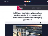 Bild zum Artikel: Erfüllung des letzten Wunsches: Patient darf mit Zigarette und Weißwein den Sonnenuntergang genießen