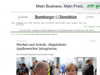 Bild zum Artikel: Flüchtlinge: Merkel und Scholz: Abgelehnte Asylbewerber integrieren