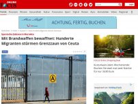 Bild zum Artikel: Spanische Exklave von Afrika - Mit Flammenwerfern bewaffnet: Hunderte Migranten stürmen Grenzzaun von Ceuta