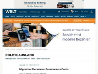 Bild zum Artikel: Migranten überwinden Grenzzaun zu Ceuta