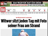 Bild zum Artikel: Er möchte nicht allein sein - Witwer sitzt jeden Tag mit Foto seiner Frau am Strand