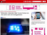 Bild zum Artikel: Beamte von Hunderten Menschen bedroht  - 'Wütender, tobender Mob' kreist Polizei ein - die wehrt sich mit Schlagstöcken