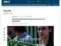 Bild zum Artikel: Klimaschutzaktivisten ketten sich an Zaun vor Kanzleramt