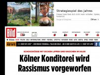 Bild zum Artikel: Rassismus versus Tradition - Konditorei verkauft Gebäck – mit Knochen im Haar