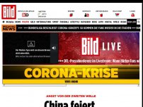 Bild zum Artikel: Angst vor der zweiten Welle - China feiert, die Welt leidet