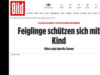 Bild zum Artikel: Illegale Demo von Masken-Gegnern - Feiglinge schützen sich mit Kind