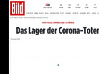 Bild zum Artikel: Mit Folie umwickelte Särge - Das Lager der Corona-Toten