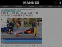 Bild zum Artikel: VIDEO: Schnauze voll – Wütende Fahrer ziehen Ökoaktivisten von blockierter Straße