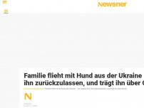 Bild zum Artikel: Familie flieht mit Hund aus der Ukraine – sie weigert sich, ihn zurückzulassen, und trägt ihn über Grenze