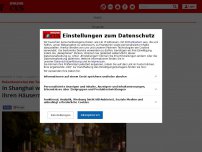 Bild zum Artikel: Rekordwerte bei den Todeszahlen - In Shanghai werden die Bewohner jetzt in ihren Häusern eingezäunt
