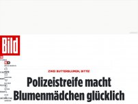 Bild zum Artikel: Zwei Butterblumen, bitte! - Polizeistreife macht Blumenmädchen glücklich