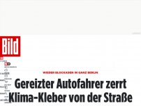 Bild zum Artikel: Wieder Blockaden in ganz Berlin - Gereizter Autofahrer zerrt Klima-Kleber von der Straße