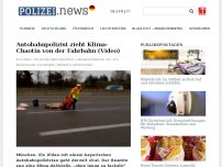 Bild zum Artikel: Autobahnpolizist zieht Klima-Chaotin von der Fahrbahn (Video)