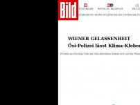 Bild zum Artikel: Wiener Gelassenheit - Ösi-Polizei lässt Klima-Kleber einfach sitzen