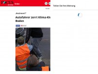 Bild zum Artikel: „Bescheuert?“: Autofahrer zerrt Klima-Kleber weg und schleudert...