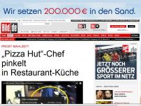 Bild zum Artikel: Prost Mahlzeit! - „Pizza-Hut“-Chef pinkelt in Restaurant-Küche