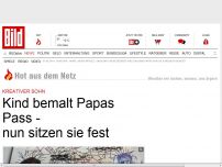 Bild zum Artikel: Kind bemalt Papas Pass - nun sitzen sie fest