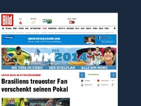 Bild zum Artikel: Brasiliens treuester Fan verschenkt seinen Pokal