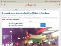 Bild zum Artikel: Demonstranten stürmten Fast-Food-Filiale in Nürnberg