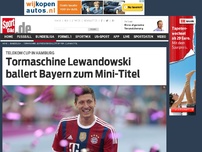 Bild zum Artikel: Tormaschine Lewandowski ballert Bayern zum Mini-Titel Mit einem Doppelpack hat Torjäger Robert Lewandowski den FC Bayern beim Telekom Cup in Hamburg zum 3:0-Finalsieg über den VfL Wolfsburg geschossen. »