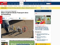 Bild zum Artikel: Schutz vor Seuche durch Clipboard? - Mann begleitet Ebola-Transport ohne Schutzanzug