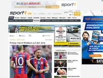 Bild zum Artikel: Ribery nimmt Robben auf den Arm