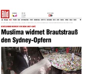 Bild zum Artikel: Bewegender Moment - Muslima legt Brautstrauß für Sydney-Opfer nieder