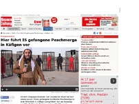 Bild zum Artikel: Hier führt IS gefangene Peschmerga in Käfigen vor